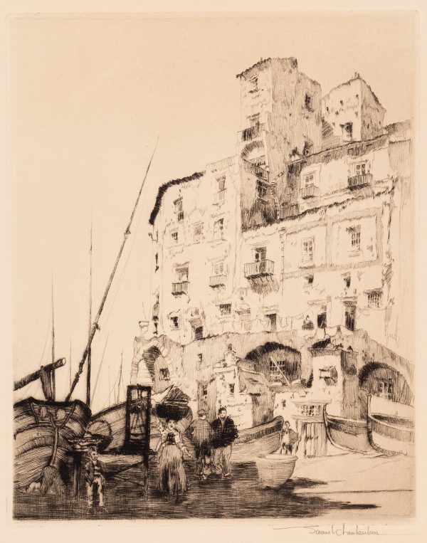 Five figures are on the beach, near large boats. Behind is a multi-story building with arches on the first story.