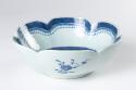 Serving Bowl with scalloped rim. There is no decoration on the outer wall