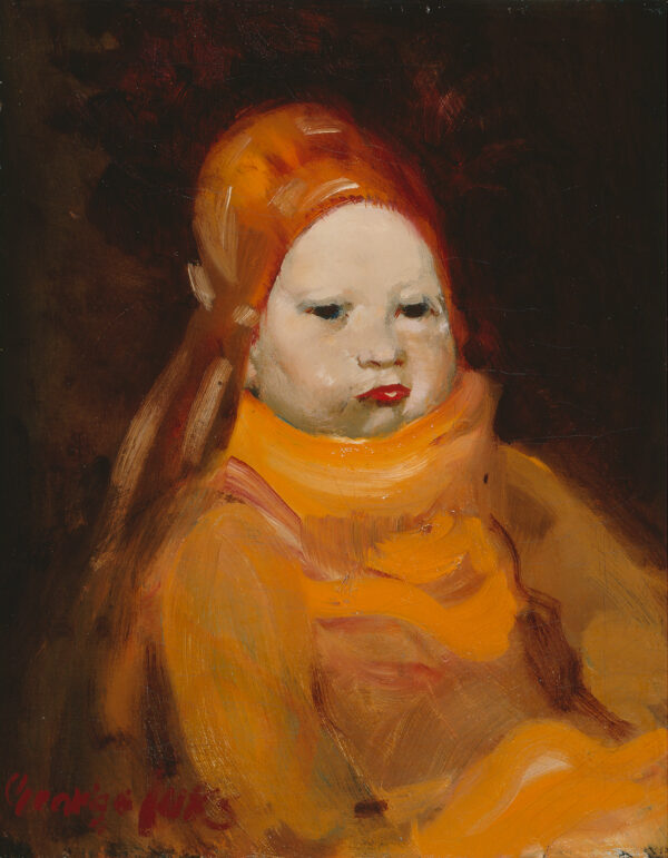 A baby wears an orange sweater and hat.