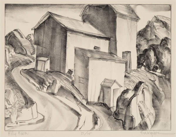 A road winds up a steep hill around several buildings with no windows. Rocky hills are on both sides