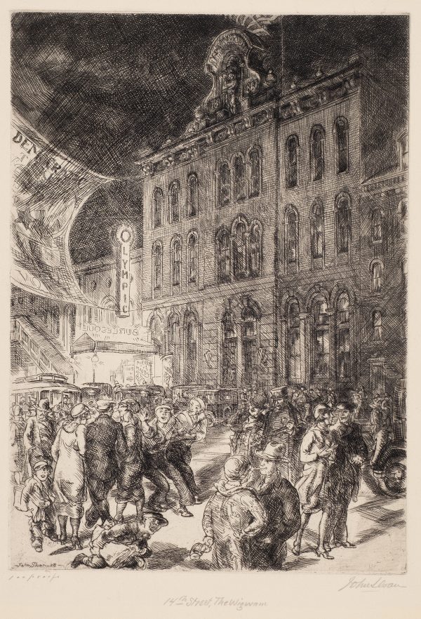 A crowd gathers in front of a tall building with a sign