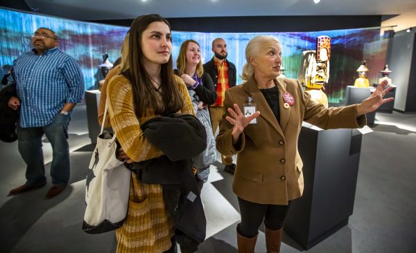 Interior image of galleries during Educator Night with adults wearing masks