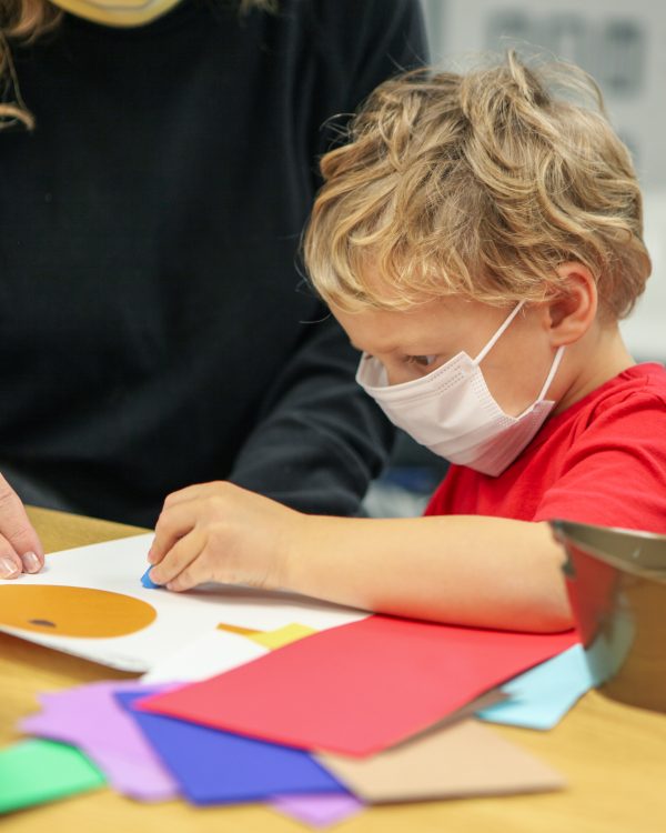 Interior view of a young boy making art