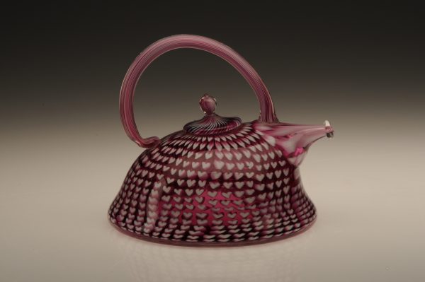 Colorful fused glass teapot by artist Richard Marquis