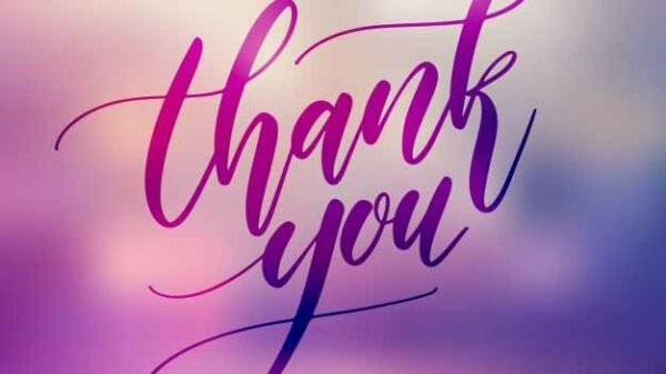 Thank you in a script font on an ombre purple to ivory background