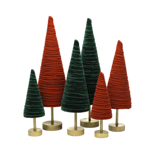 Grouping of decorative fir trees in bright reds and greens on natural wood-toned bases