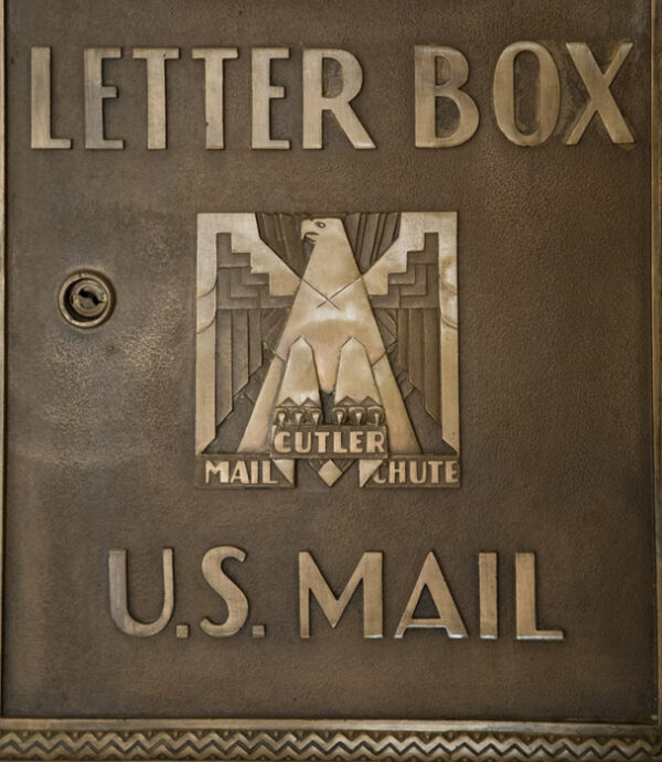 Brass relief with words Letter Box over an eagle with outstretched wings over words U.S. Mail