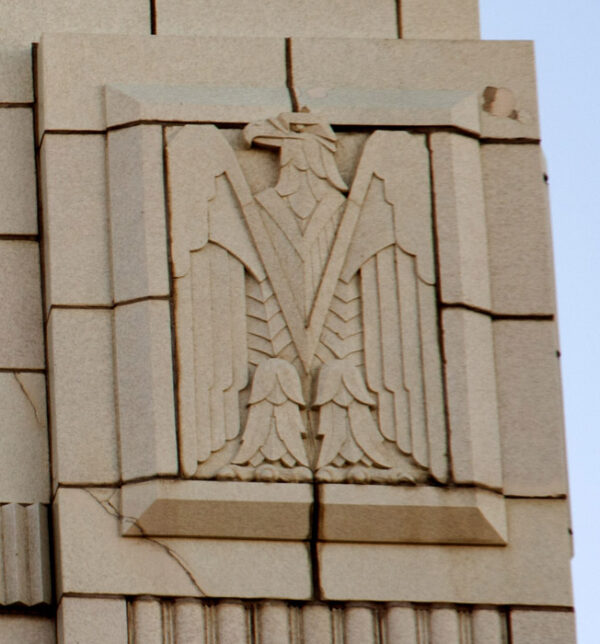 Relief sculpture in Art Deco style of an eagle, carved from white stone