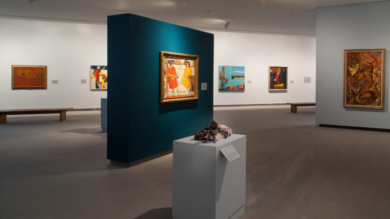 Photo of the museum's galleries showcasing the permanent collection, including six paintings and one multi-media sculpture