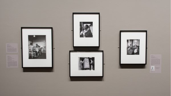 Gallery image of four photographs displayed in black frames with white mats