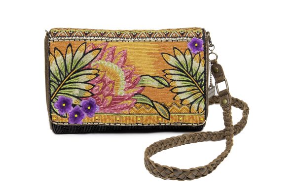 Beaded clutch purse with an orange and pink flower and green leaves pattern on a yellow-orange background